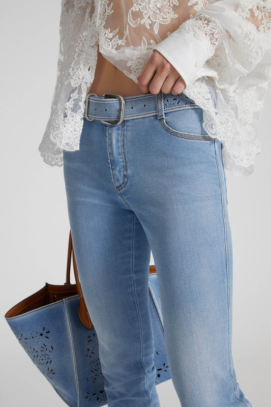 Denim belt with geometric cut-out
