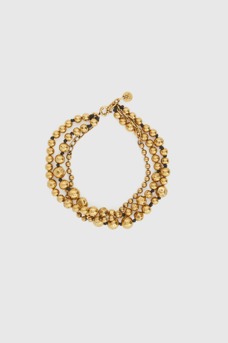 Three-strand necklace of gold metal pearls