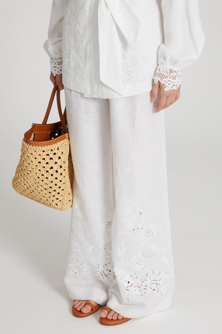 Soft linen trousers with drawstring waist and handmade embroidery