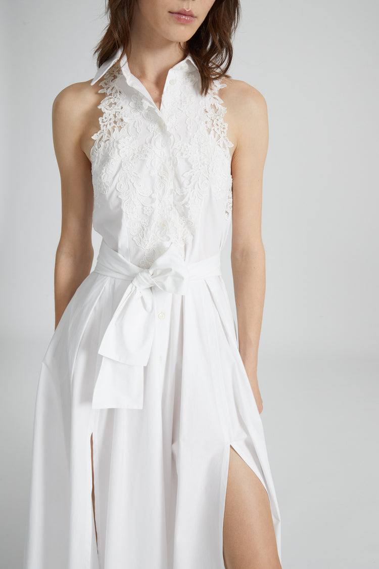 Long sleeveless chemise dress with lace appliqués and waist sash