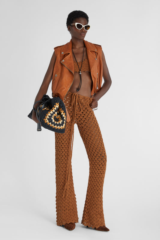 Brown trousers in pure cotton with hand-made crochet work