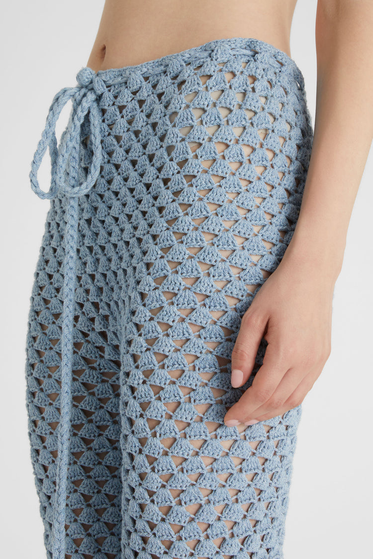 Light blue trousers in pure cotton with hand-made crochet work