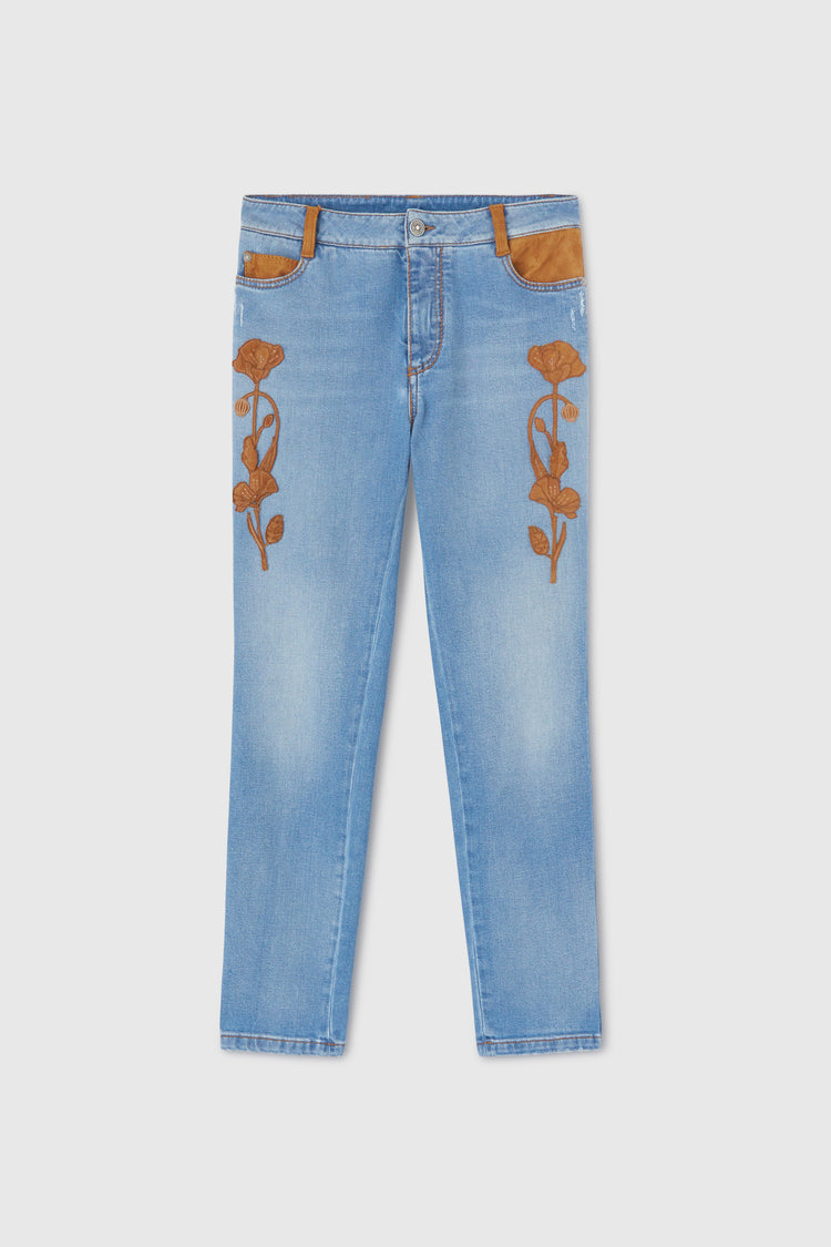 Slim fit jeans with floral details handmade in suede and rafia