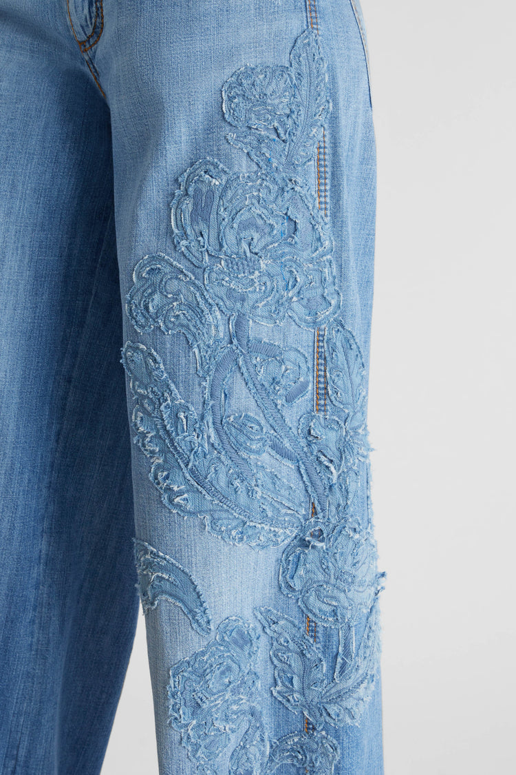 Palazzo jeans with handmade denim lace application