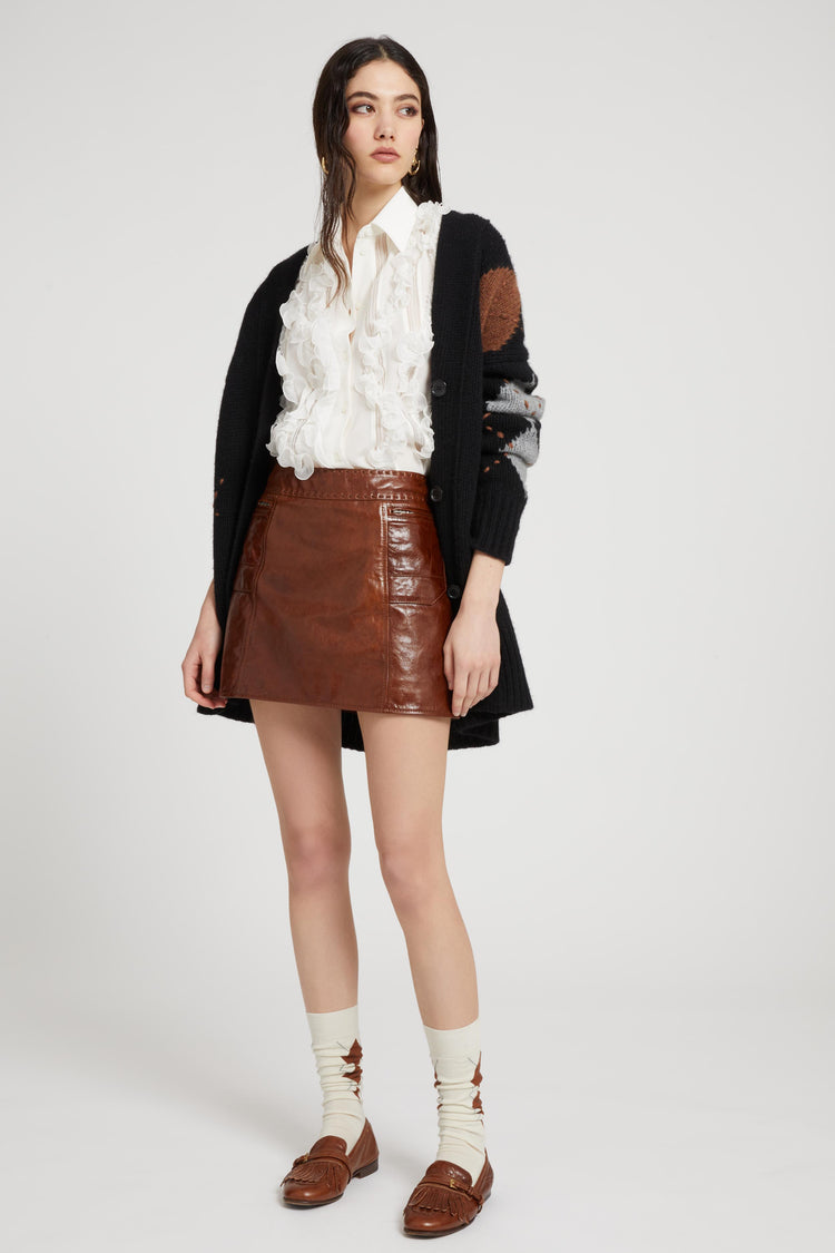 Silk sleeveless shirt with ruffles