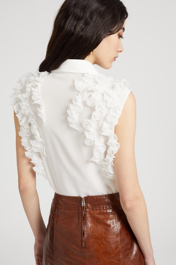 Silk sleeveless shirt with ruffles