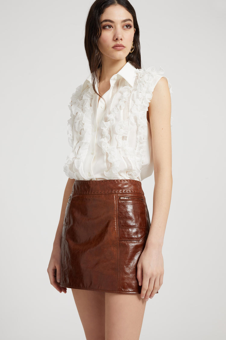 Silk sleeveless shirt with ruffles