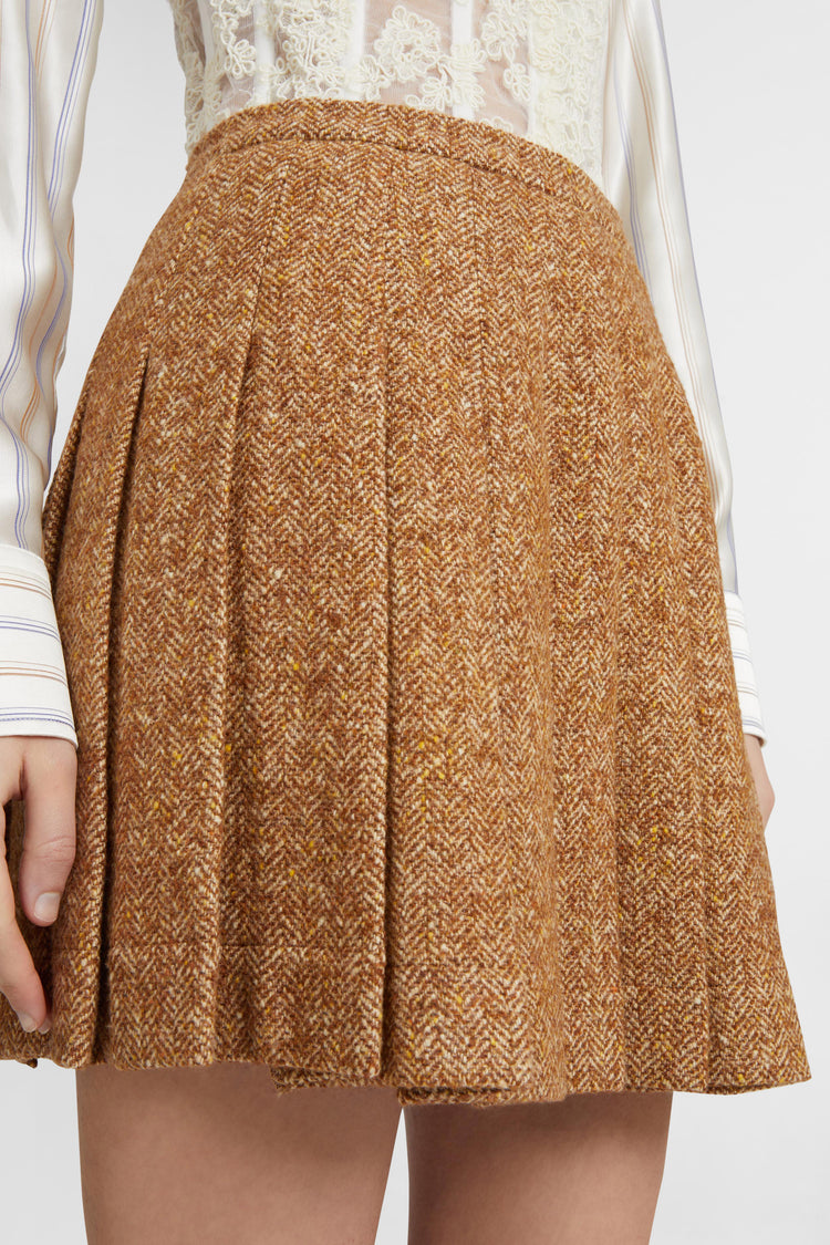 Wool blend pleated mini skirt with herringbone pattern