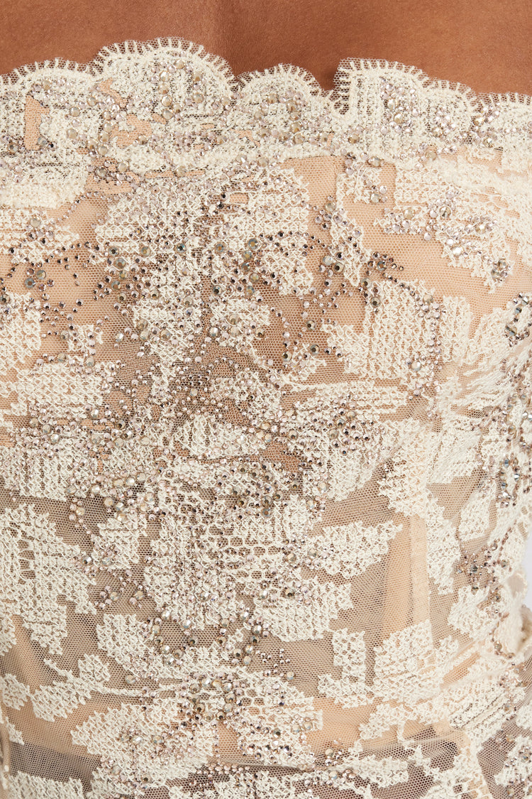 Abito bustier in pizzo e cristalli