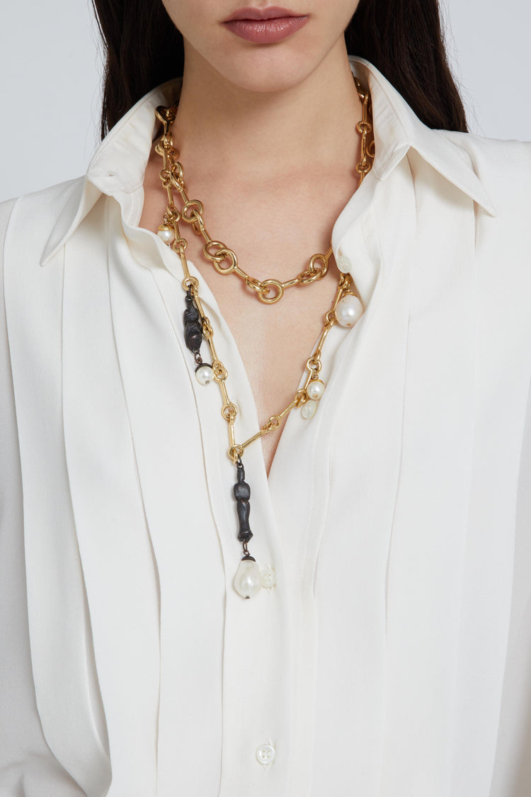 Multi-strand necklace with Reverse chain