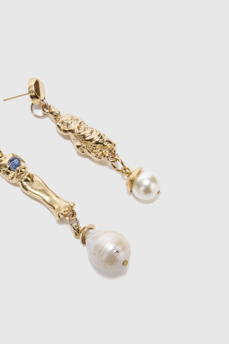 Earrings with sculptural pendants and pearls