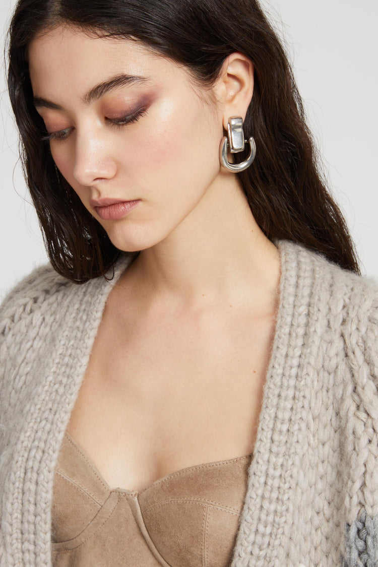 Small platinum half-hoop earrings