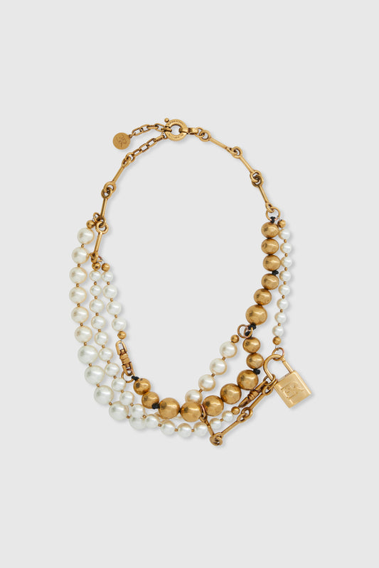 Multi-strand necklace with mix of pearls, glass, and hand-hammered metal beads - gold tone