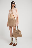 Cropped cardigan in pure cashmere with covered buttons and jour stitching