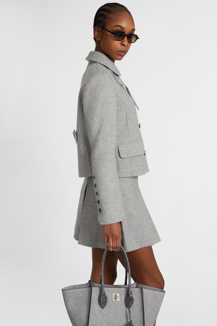 Short double-breasted coat in virgin wool blend with adjustable collar