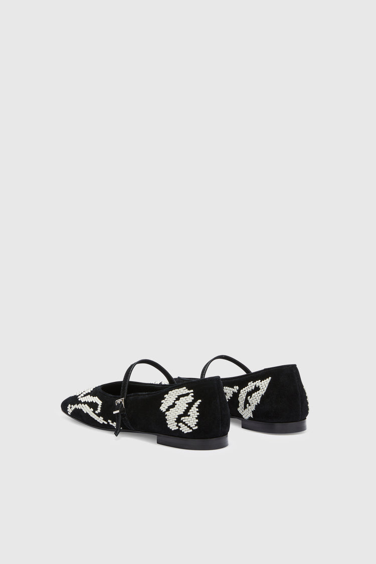 Suede ballerina with hand-embroidered leather ribbon detail