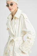 Double-breasted technical trench with hand-finished detailing