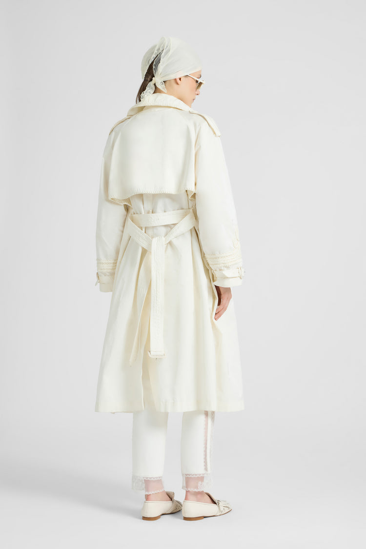 Double-breasted technical trench with hand-finished detailing