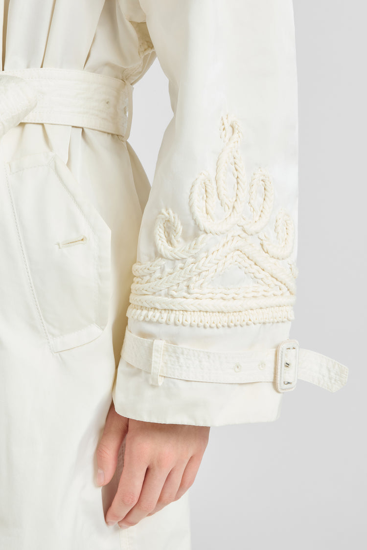 Double-breasted technical trench with hand-finished detailing