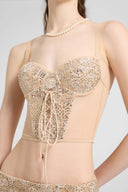Vintage-inspired tulle corset top with maiolica lace and hand-applied crystals