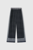 Pantalone palazzo in pura seta stampata bandana con cristalli applicati a mano