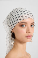 Square silk scarf with black polka dots on white background