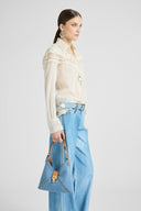 Mini Clio bag in denim with perforated edges