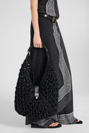 Large hobo bag in black raffia with bamboo handle
