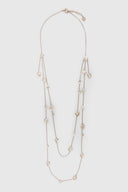 Multistrand necklace with daisy pendants