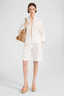 Linen blouse with ties and floral rebrodé lace