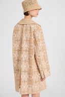 Trench en dentelle rebrodée contrecollée sur tulle