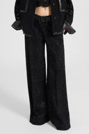 Pantalone palazzo in pizzo con cristalli applicati a mano