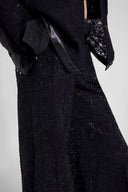 Pantalone palazzo in pizzo con cristalli applicati a mano