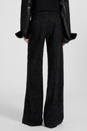 Pantalone palazzo in pizzo con cristalli applicati a mano