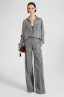 Pantalone palazzo in georgette tecnica con stampa principe di galles e cristalli applicati a mano