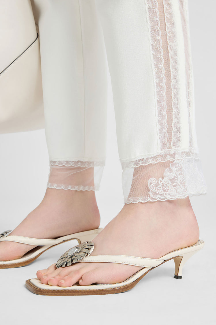 Cigarette-fit denim trousers with Valencienne lace inserts