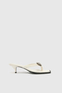 Nappa thong sandal with 5 cm heel and metal daisy