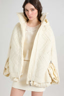 Oversized puffer jacket in textured technical fabric