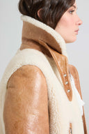 Giacca aviator corta in montone cerato con zip