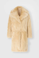 Single-breasted midi coat in long-hair Toscana shearling