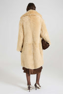 Single-breasted midi coat in long-hair Toscana shearling