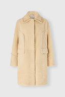 Single-breasted midi shearling coat with brogue detailing