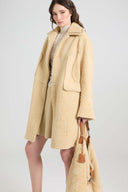 Single-breasted midi shearling coat with brogue detailing