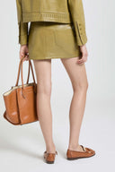 Nappa leather mini skirt with denim-inspired construction