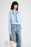 Silk shirt with a masculine striped allure