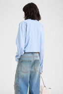 Silk shirt with a masculine striped allure