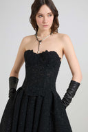 Rebrodé lace bustier with tone-on-tone crystals and V-shaped hem