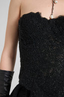 Rebrodé lace bustier with tone-on-tone crystals and V-shaped hem