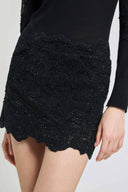 Mini skirt in rebrodé lace with tonal crystals