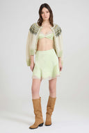 Pure silk satin mini skirt with contrasting rebrodé lace